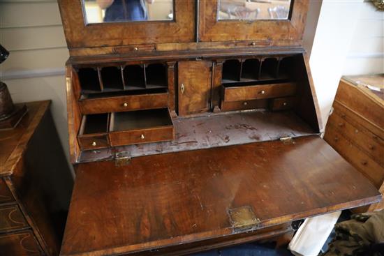A mid 18th century walnut bureau bookcase, W. 3ft 6in. D. 1ft 11in. H. 7ft 2in.